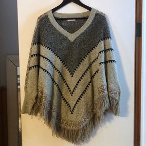 Poncho with sleeves